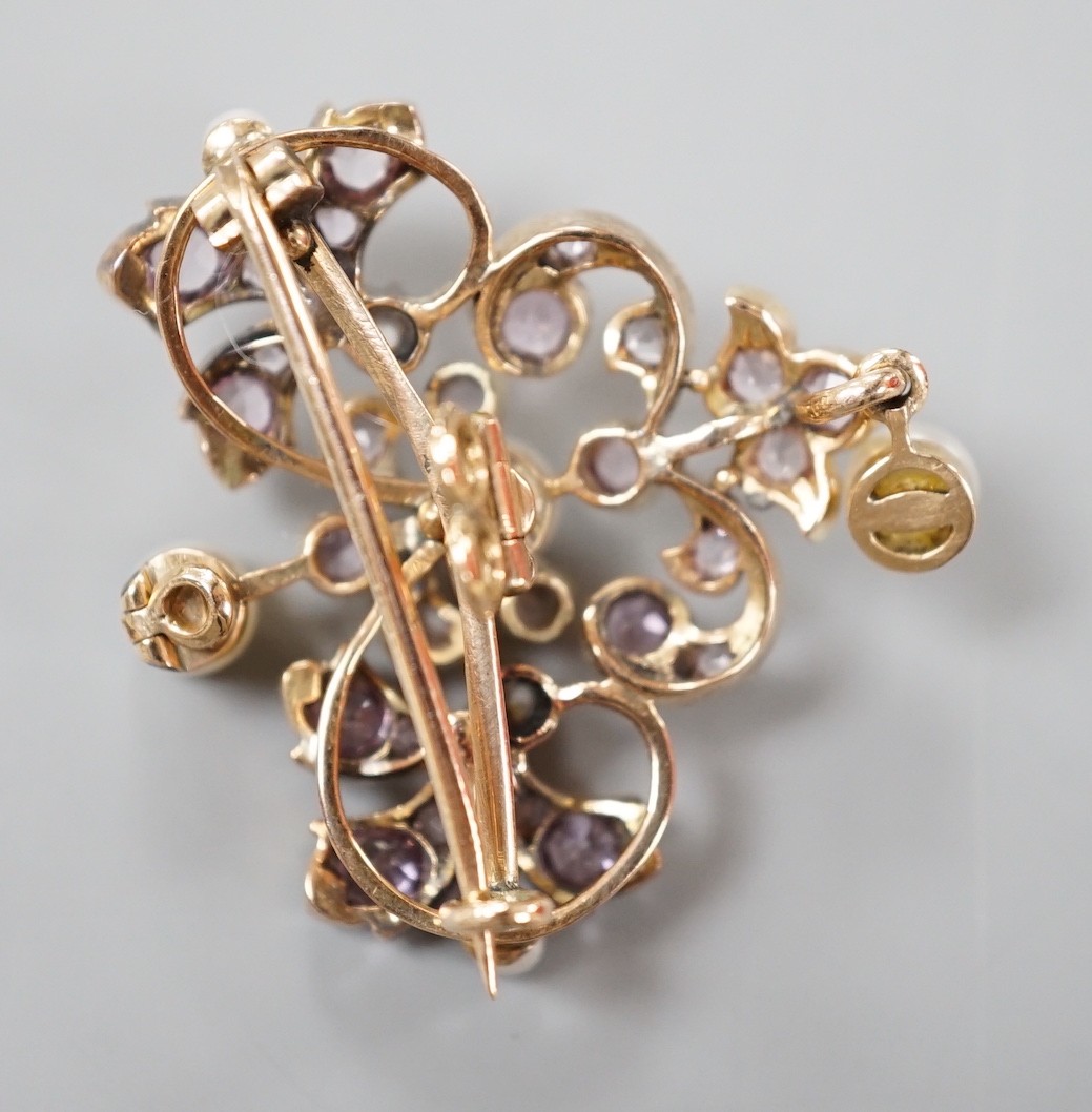 An early 20th century yellow metal, diamond, cultured pearl and pink topaz? cluster set pendant brooch, width 30mm, gross weight 9.1 grams.